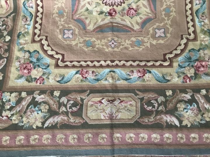 French Aubusson Style Needlepoint Carpet: French Aubusson Style Needlepoint Carpet. Measures 70 x 70 inches approximately.