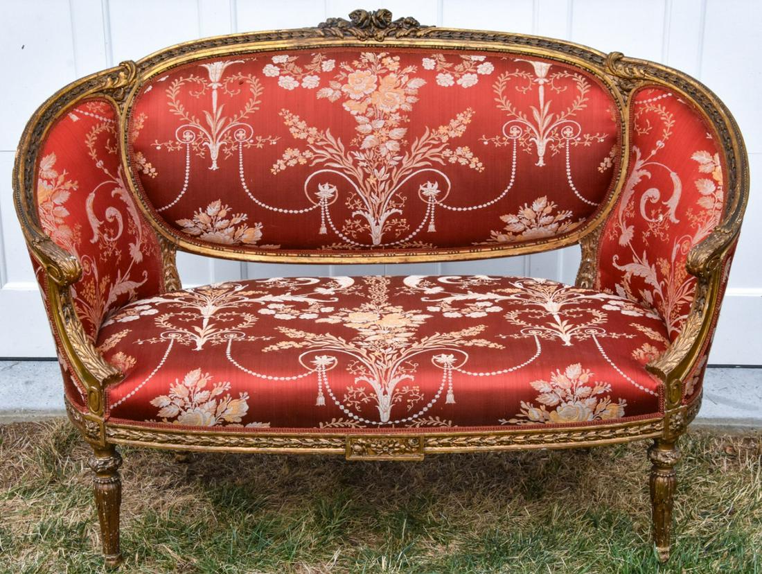 French Country Louis XV Silk Damask Settee: French Country Louis XV Silk Damask Upholstered Carved Settee. Upholstered in red and gold silk damask in a Florentine pattern. 38 inches x 54 inches x 26 inches