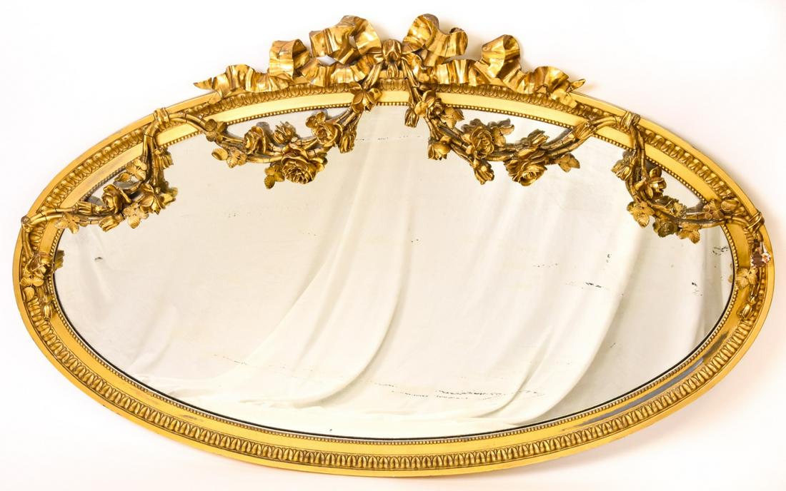 Rococo Carved Oval Mirror w Ribbon Motif: Rococo Carved Oval Mirror w Ribbon Motif. 34 inches x 53 inches x 6 inches