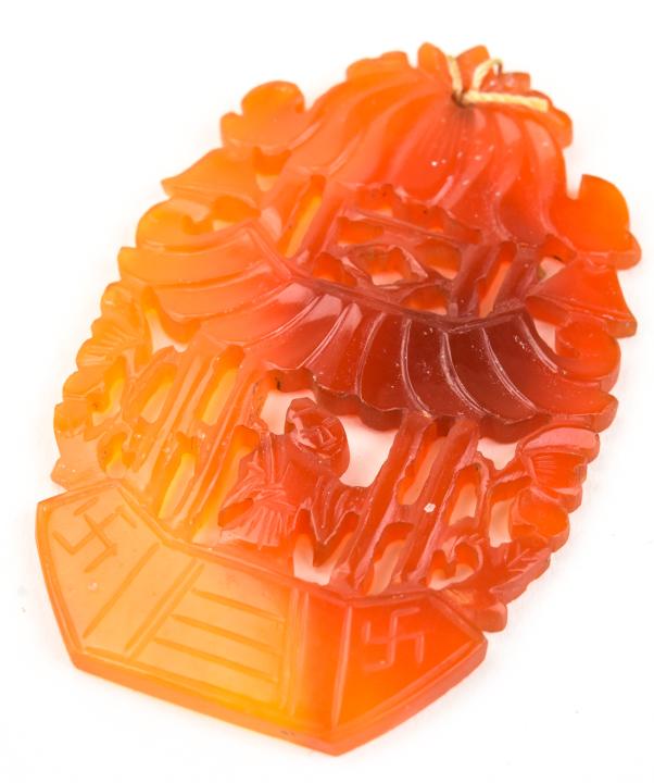 Antique Chinese Hand Carved Carnelian Pendant: Antique Chinese Hand Carved Carnelian Pendant. Carved pagoda with figure. Measures 2 inches in length.