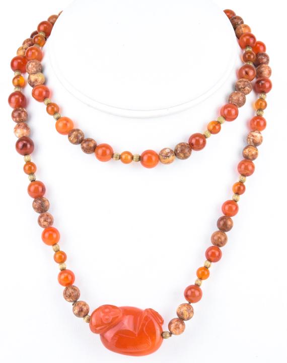 Estate Chinese Carnelian & Moss Agate Necklace: Estate Chinese Carnelian & Moss Agate Necklace w Hand Carved Carnelian Monkey Pendant. Measures 30 inches in length.