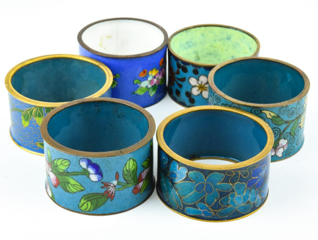 Six Chinese Hand Painted Enamel Napkin Rings: Six Chinese Hand Painted Enamel Napkin Rings.