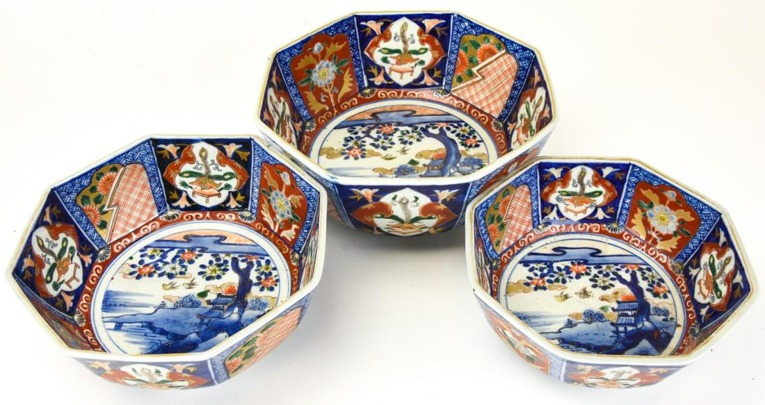 Set Three Antique Japanese Imari Porcelain Bowls: Set Three Antique Japanese Imari Porcelain Bowls. Graduated round sizes. Hand paint and gilt decorated. Largest measures 12.5 inches in diameter approximately.