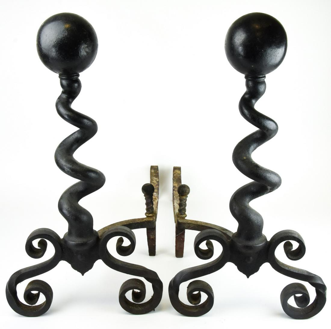 Pair Arts & Crafts Style Wrought Iron Andirons: Pair Arts & Crafts Style Wrought Iron Andirons. Measures 23 inches x 22 inches x 12 inches.