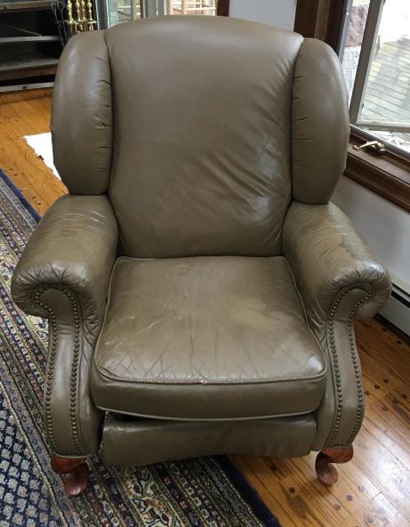 Gray Leather Recliner: Gray Leather Recliner. With nailhead trim. Measures 43 inches x 37 inches x 32 inches