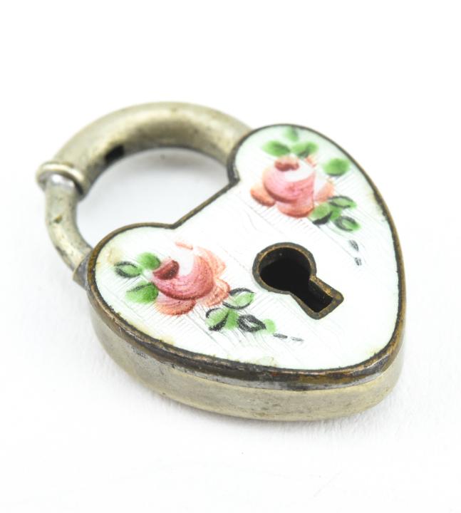 Antique Circa 1900 Silver Guilloche Enamel Locket: Antique Circa 1900 Silver Guilloche Enamel Locket. Heart shaped padlock form necklace/pendant/charm/clasp. Measures just under 1 inch in length.