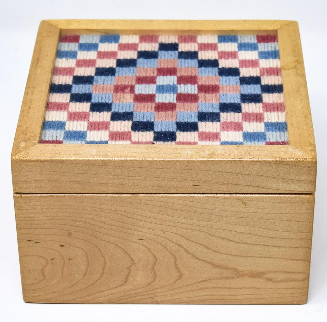 Folk Art Woven Motif Jewelry Box: Folk Art Woven Motif Jewelry Box. Wooden jewelry box with folk art woven top. Measures 3.5 inches x 5.5 inches x 5.5 inches.