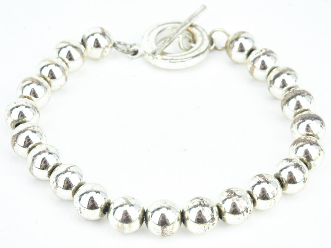 Sterling Silver Bracelet with Large Toggle Clasp: Sterling Silver Bracelet with Large Toggle Clasp. Hallmarked. Measures 8.25 inches in length.