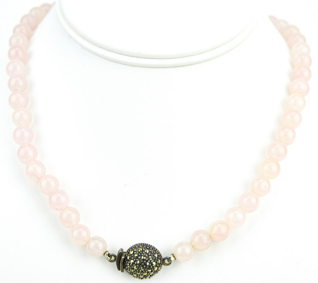 Sterling Marcasite & Rose Quartz Necklace: Sterling Marcasite & Rose Quartz Necklace. Measures 17 inches in length. Sterling silver clasp is set with rose cut marcasites.