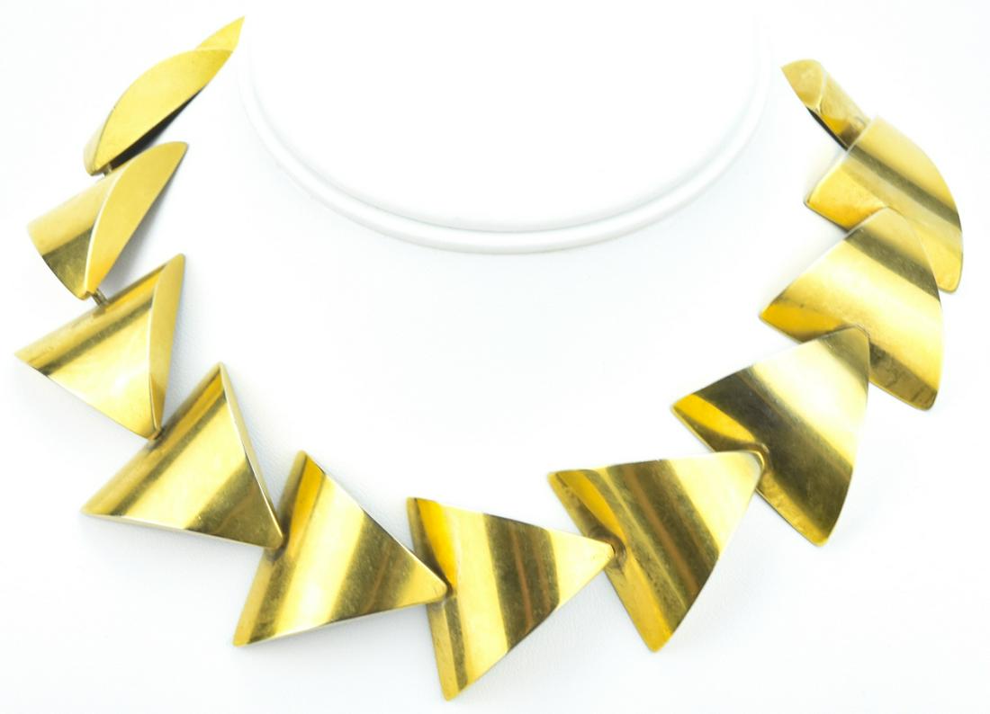 Vintage Robert Lee Morris Articulated Necklace: Vintage Robert Lee Morris Articulated Necklace. Gold over silver articulated panel necklace. Hand signed by Robert Lee Morris. Measures 15.5 inches in length.