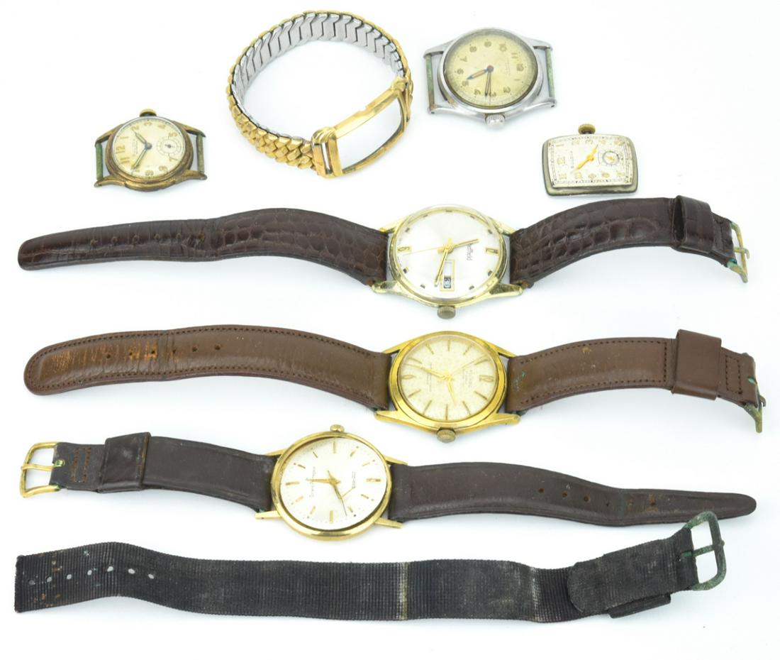 Collection of Vintage Wrist Watches: Includes two (2) Bulova Watertight, Picard 17 Jewels, Girard Perregaux, Universal Geneve and Sheffield.