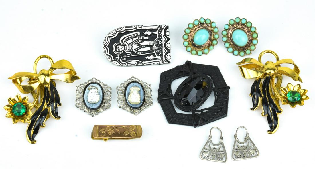 Collection of Vintage Sterling & Costume Jewelry: Collection of Vintage Sterling & Costume Jewelry. Pair of gilt metal, black enamel and paste clips measure 2.5 inches in length.