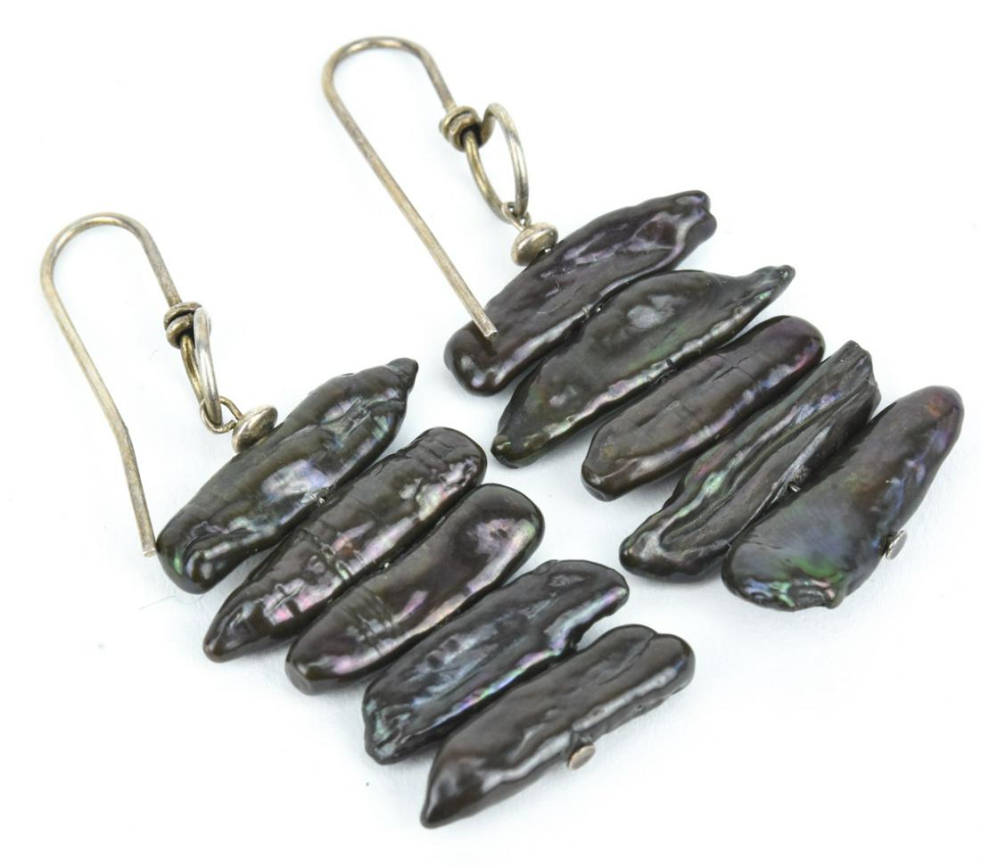 Sterling Silver Tahitian Biwa Pearl Earrings: Sterling Silver & 20mm-22mm Tahitian Biwa Pearls Articulated Drop Earrings. Weighs approximately 8 grams inclusive. Each measures just over 2 inches in length.