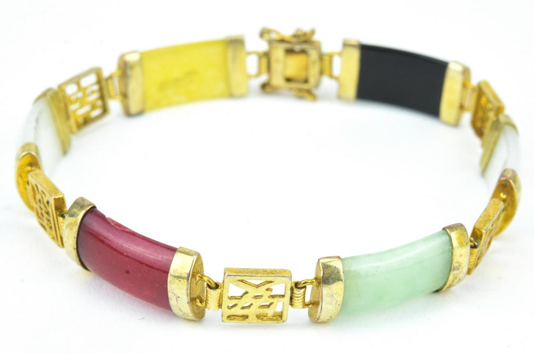 Vintage Chinese Semi Precious Stone Bracelet: Vintage Chinese Semi Precious Stone Bracelet. Set with onyx, rose quartz, jade, and carnelian. Measures 7.5 inches in length.