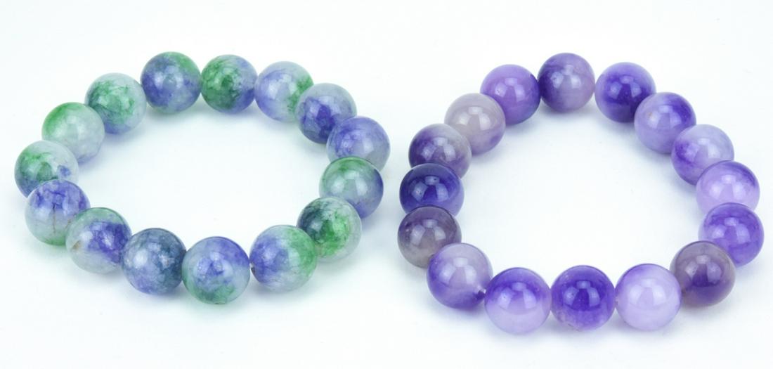 Two 12mm Lavender Jade Bead Bracelets: Two (2) 12mm Lavender Jade Bead Bracelets. Beads are approximately 12mm in diameter.