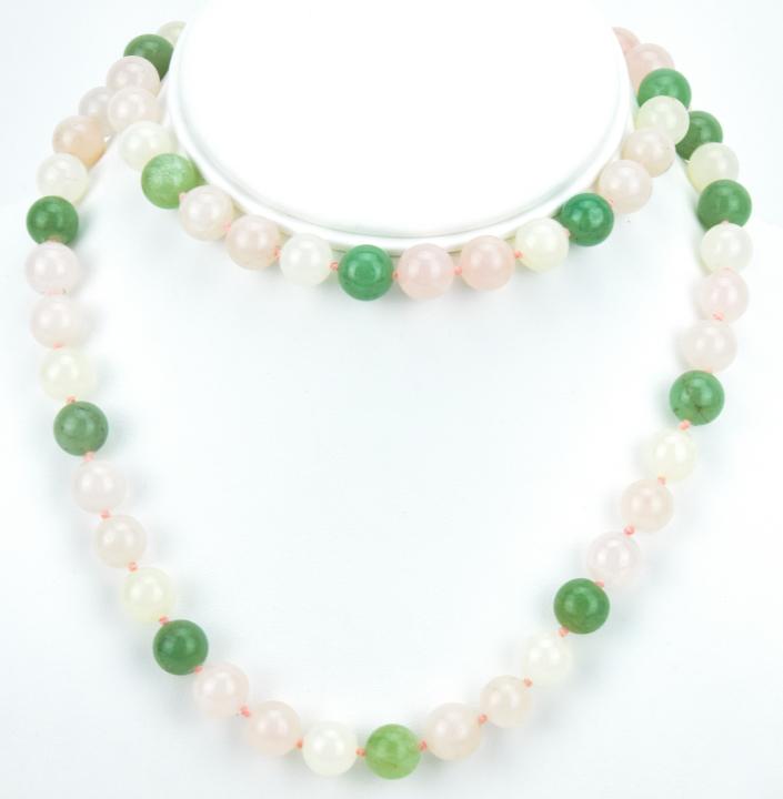 Antique Rose Quartz & Jade Necklace Strand: Antique Rose Quartz & Jade Necklace Strand. Hand knotted necklace with 10mm rose quartz and green jadeite beads. Measures 30 inches in length.