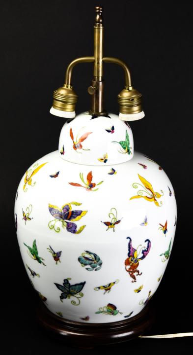 Asian Porcelain Ginger Jar Shaped Table Lamp: Asian Porcelain Ginger Jar Shaped Table Lamp Hand Painted. With butterfly motif. Measures 21 inches in height by 9 inches in diameter.