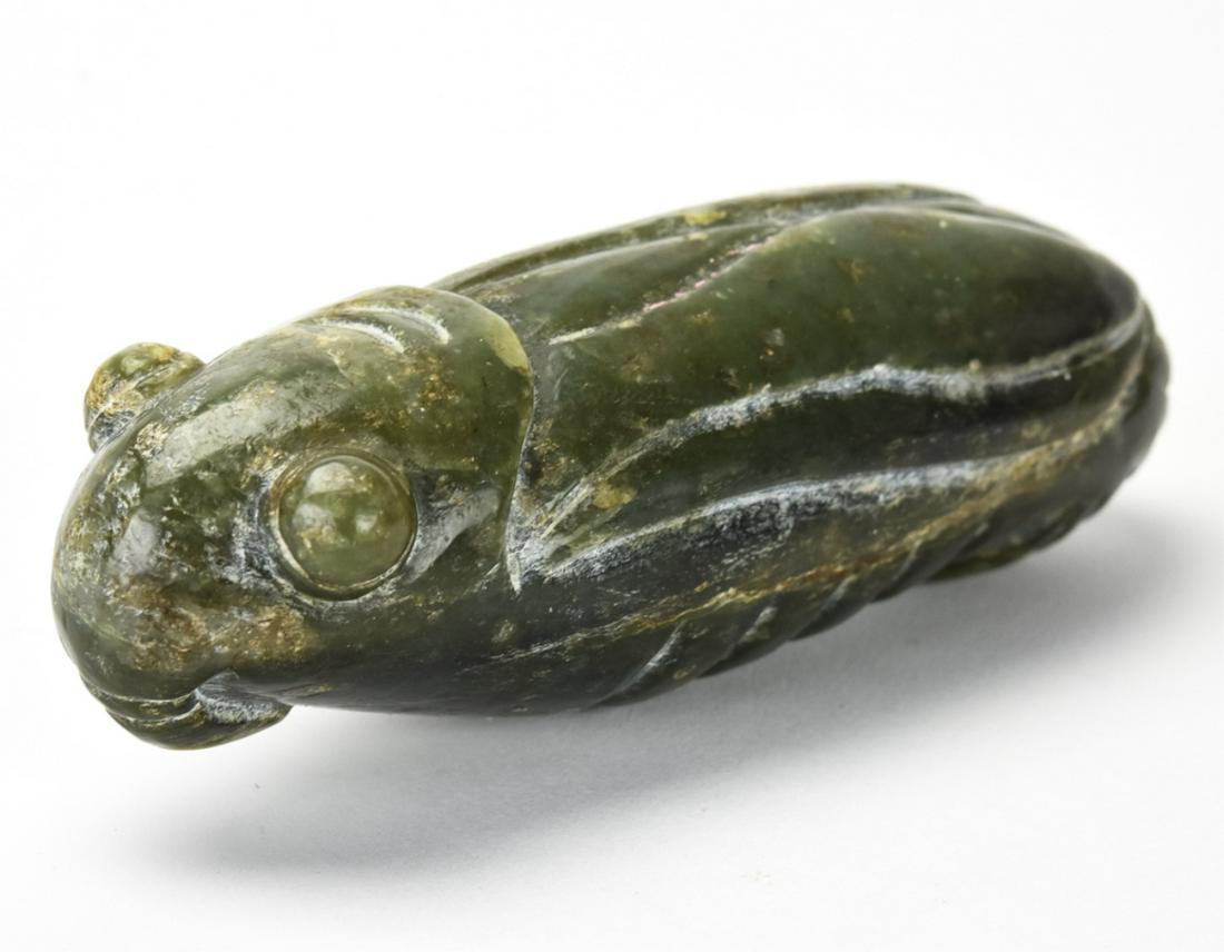 Chinese Hand Carved Jade Figural Cicada Statue: Chinese Hand Carved Jade Figural Cicada Statue. Hand carved cicada. Tests as jadeite on the presidium. Measures 5 inches in length.
