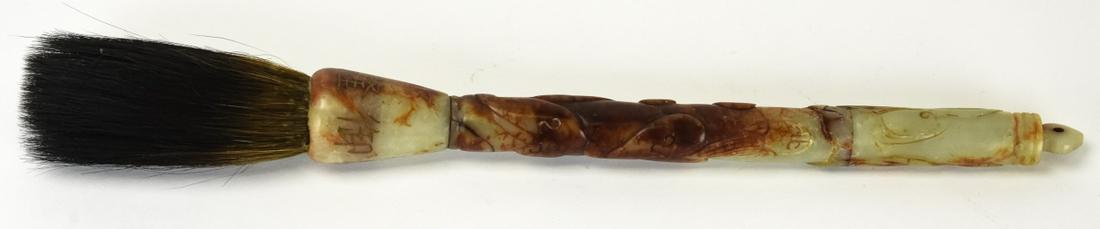 Chinese Hand Carved Jade Scholar Brush: Chinese Hand Carved Jade Scholar Brush. Chinese scholar brush with hand carved jade handle. Tests as jadeite on the presidium. Measures nearly 15 inches in total length.