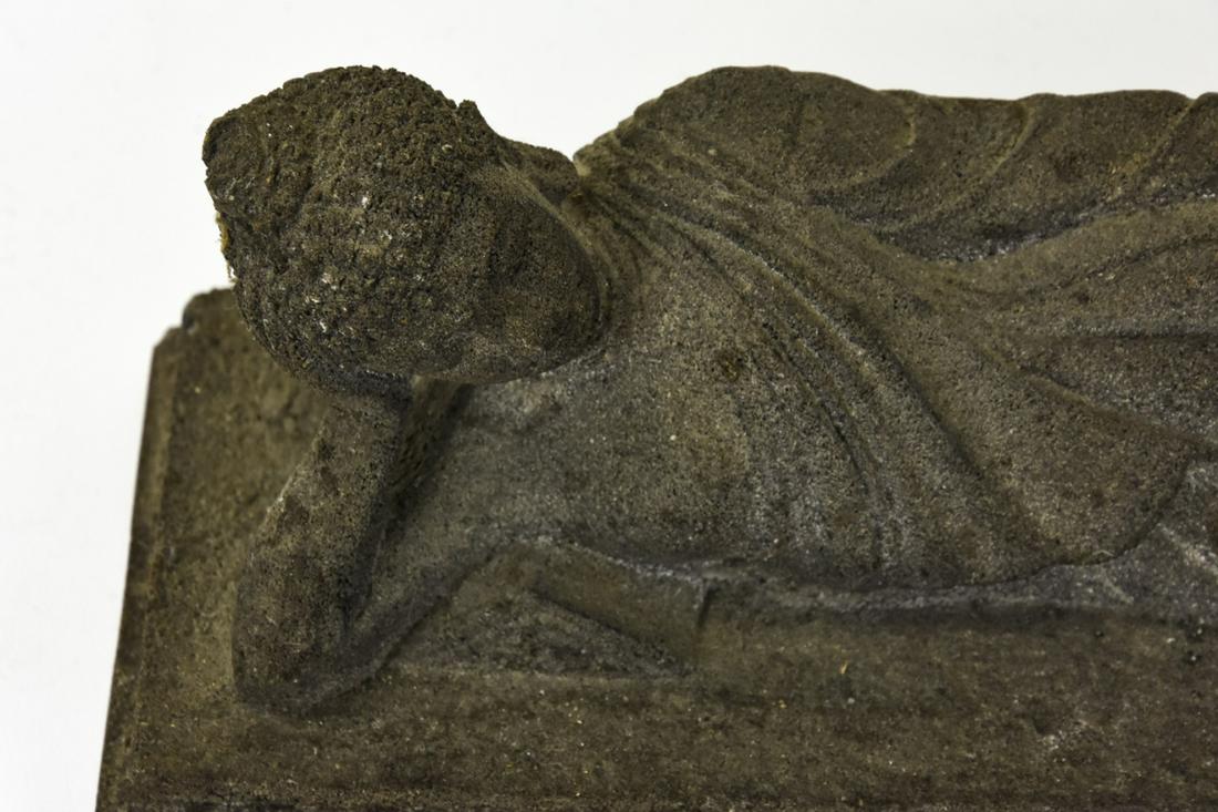 Chinese Cast Stone Relining Buddha Statue: Chinese Cast Stone Relining Buddha Statue. Figural cast stone statue of a reclining Buddha figure. Measures4 inches x 12 inches x 4.5 inches.