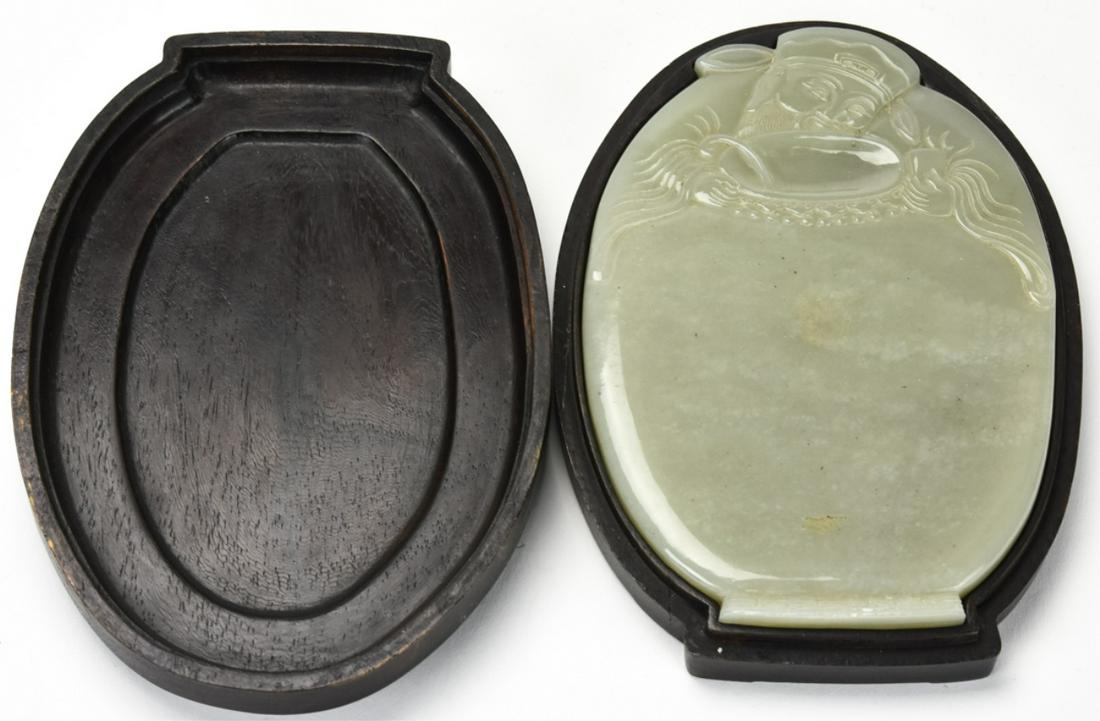 Chinese Hand Carved Jade Figural Sage Plaque: Chinese Hand Carved Jade Figural Sage Plaque. Chinese hand carved jade plaque depicting a sage in a fitted box. Tests as jadeite on the presidium. Box measures 6.5 inches x 4.5 inches.