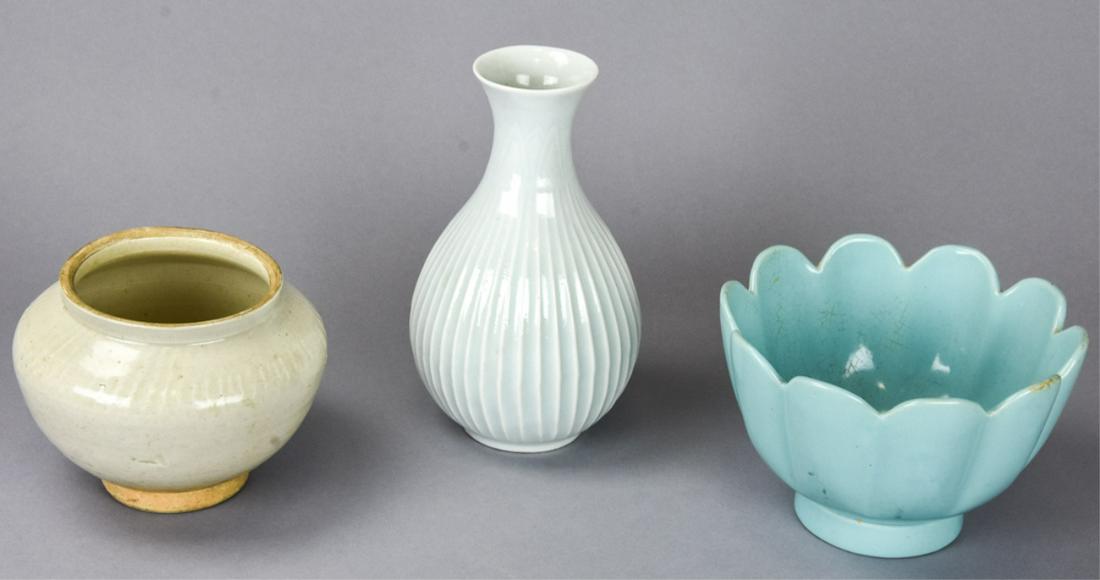 3 Chinese Porcelain Decorative Items: 3 Chinese Porcelain Decorative Items. Includes robins egg blue glaze lotus bowl, earth tone glaze vessel, and celadon vase which measures 7.5 inches x 4 inches.