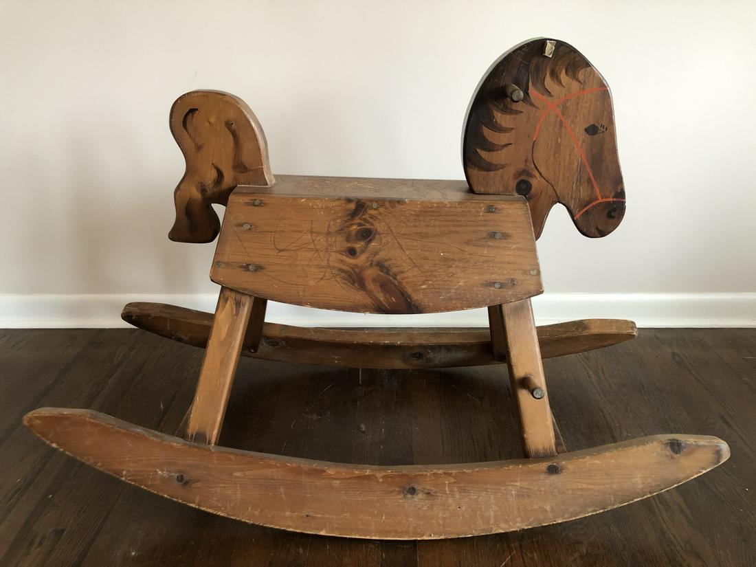 Vintage Hand Carved Child's Toy Rocking Horse: Vintage Hand Carved and Hand Painted Child's Toy Rocking Horse. 29 inches x 44 inches x 23 inches.