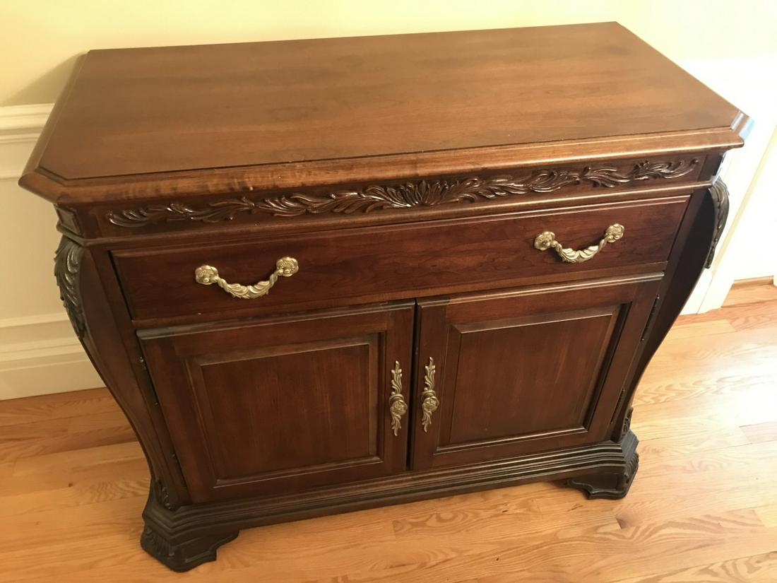 Mahogany Tone Console or Buffet by Bob Mackie: Mahogany Tone Console or Buffet by Bob Mackie. Measures 39 x 51 x 24 inches.
