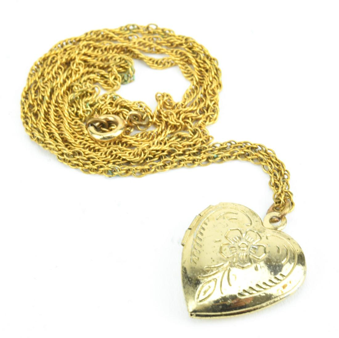 Vintage Gold Filled Heart Locket Necklace Pendant: Vintage Gold Filled Heart Locket Necklace Pendant. Rope chain measures 25 inches in length.