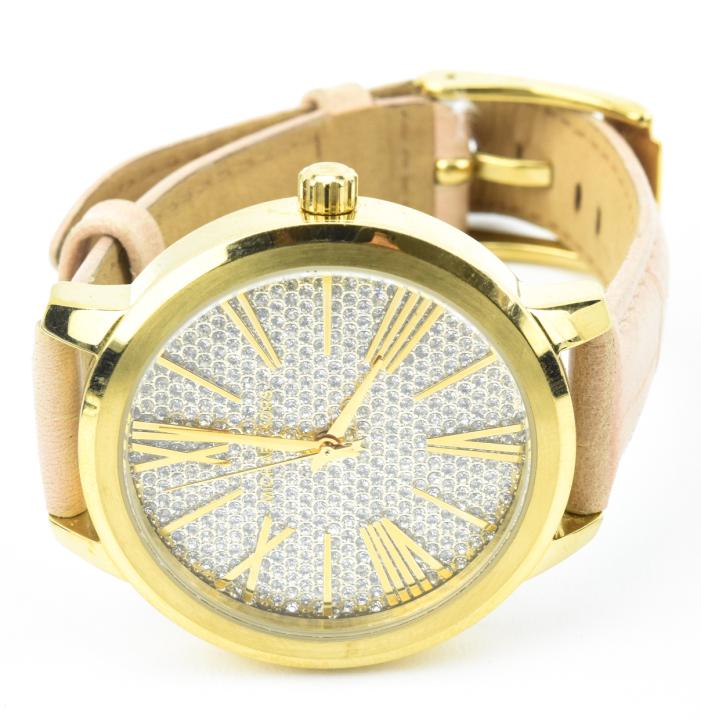 Michael Kors Gilt Metal Watch: Michael Kors Gilt Metal Watch.