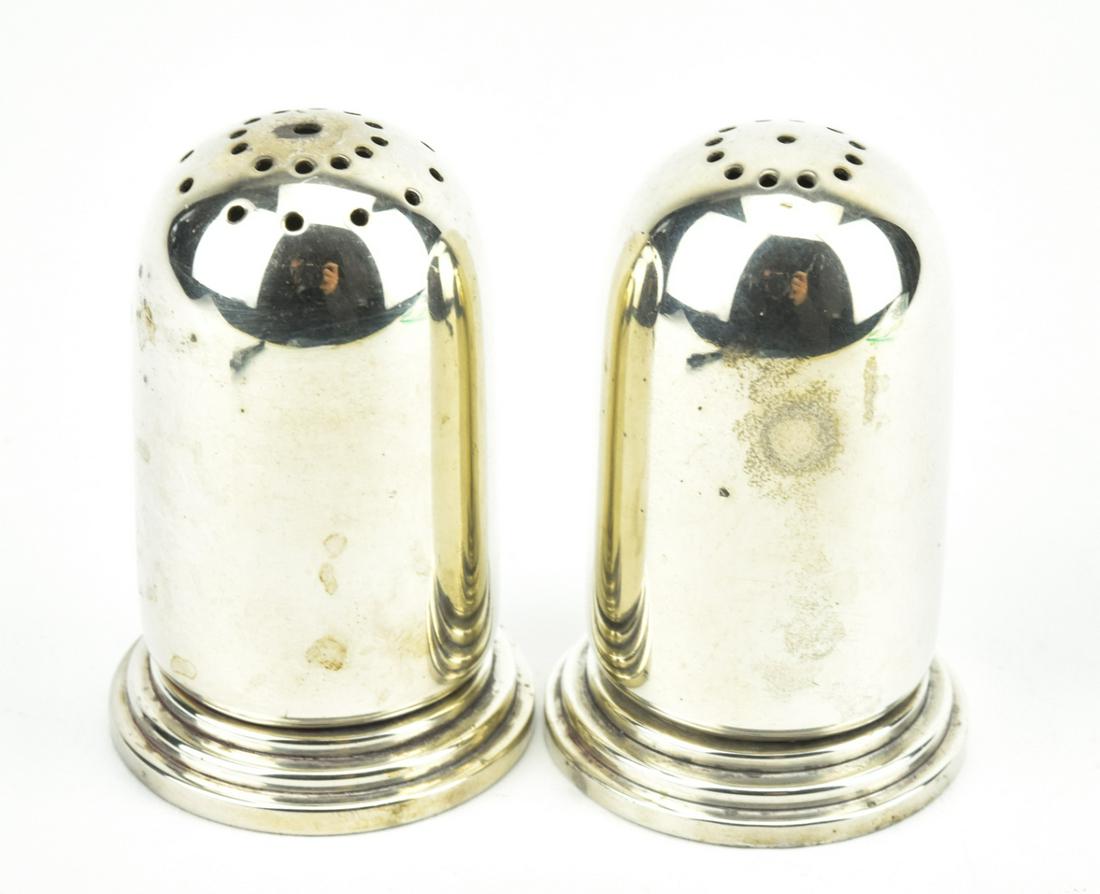 Pair of Sterling Silver Salt & Pepper Shakers: Pair of Sterling Silver Salt & Pepper Shakers. Signed CC Hermann Denmark sterling. Each measures 2 inches in height.