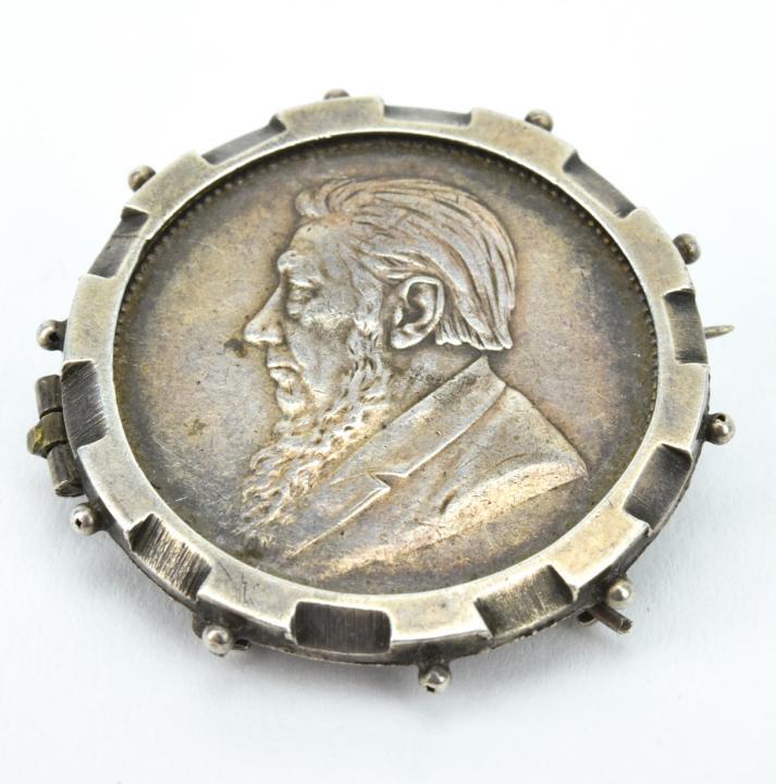 Antique 19th C Lovers' Token Brooch: Antique 19th C Lovers' Token Brooch. Custom made sterling frame that holds a circa 1896 two shillings coin from South Africa. Measures just over 1.25 inches in diameter. Coin can be removed from frame