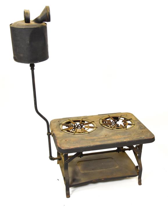 Antique Cast Iron Oil Burning "Princess" Stove: Antique Cast Iron Oil Burning "Princess" Stove. Measures 40 inches high x 23 inches wide x 16 inches deep.