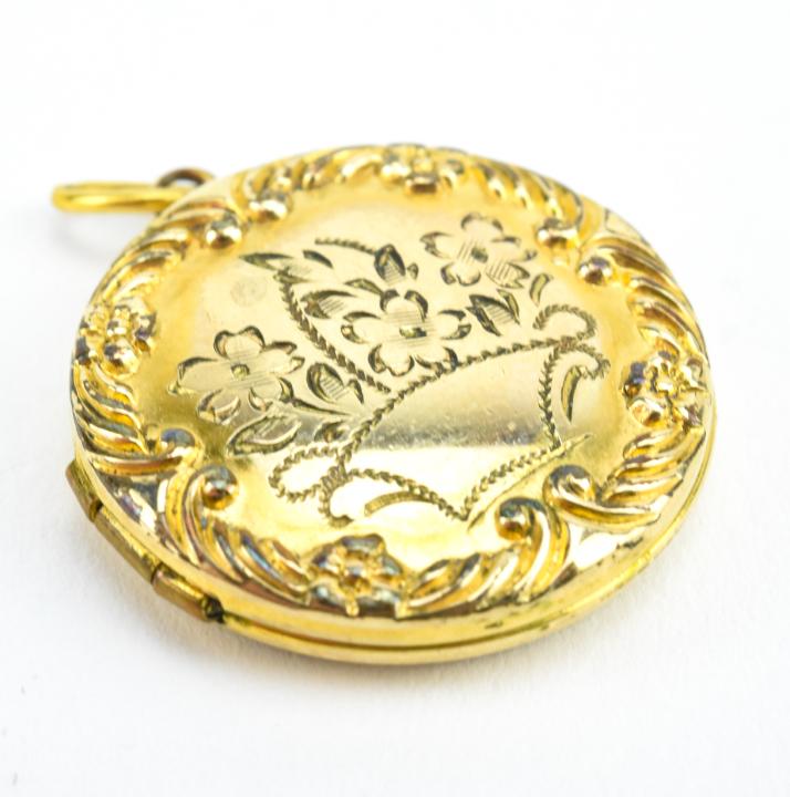 Antique Gold Locket W Gardinetto Scene: Antique Gold Locket W Gardinetto Scene. Gold filled locket with repousse border and gardinetto style basket with flowers at center. Measures 1.25 inches in length.