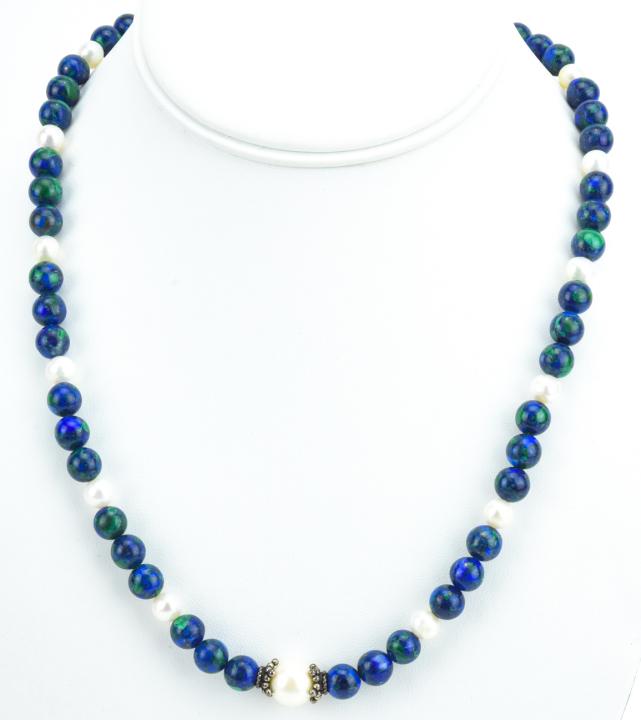 Sterling Silver Baroque Pearl & Sodalite Necklace: Sterling Silver Baroque Pearl & Sodalite Necklace. Clasp is hallmarked. Measures 20 inches in length.