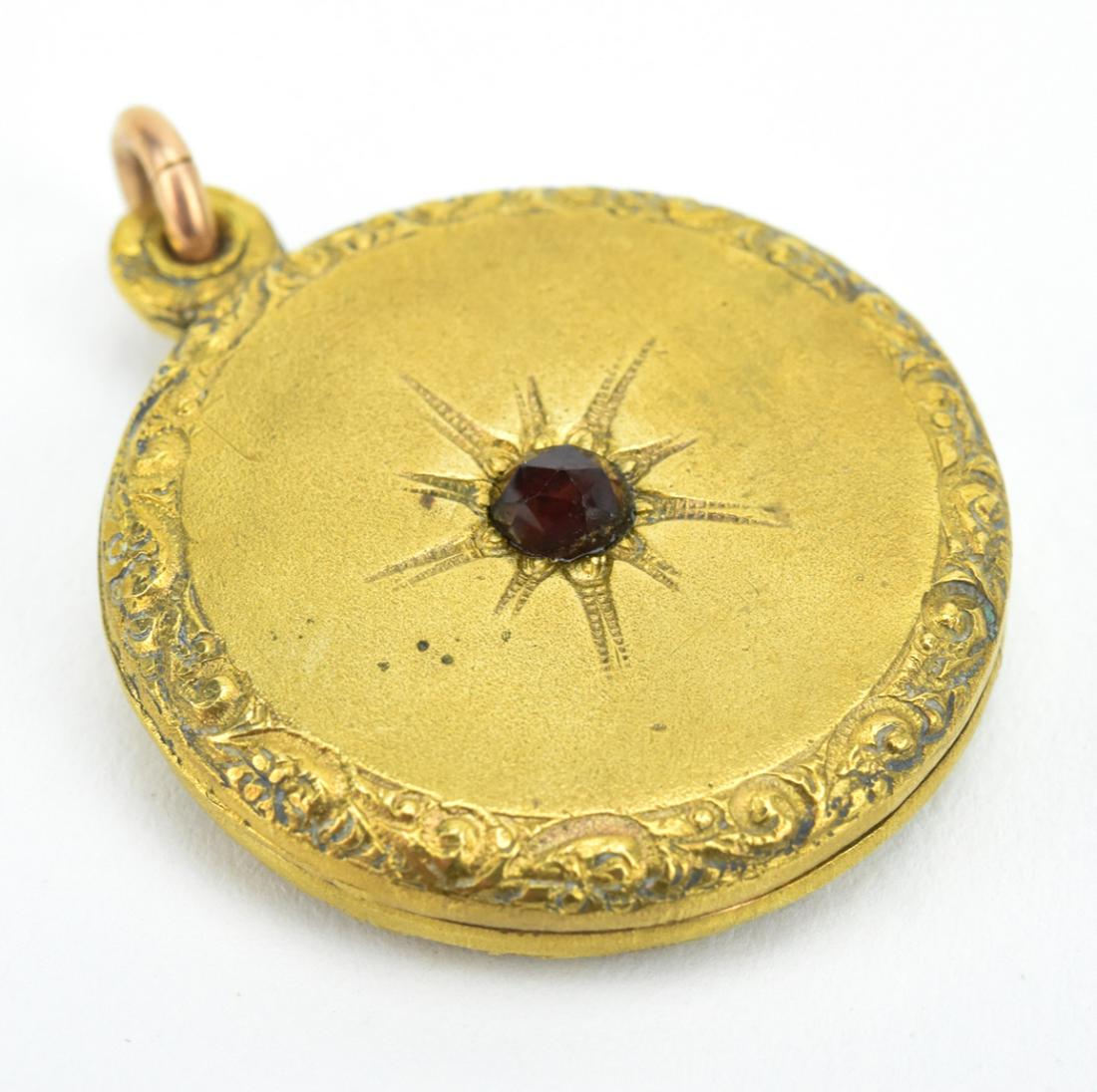 Antique 19th C Rose Cut Garnet Locket Pendant: Gold filled necklace pendant with gypsy set rose cut garnet starburst. Measures just over 1.25 inches in length.