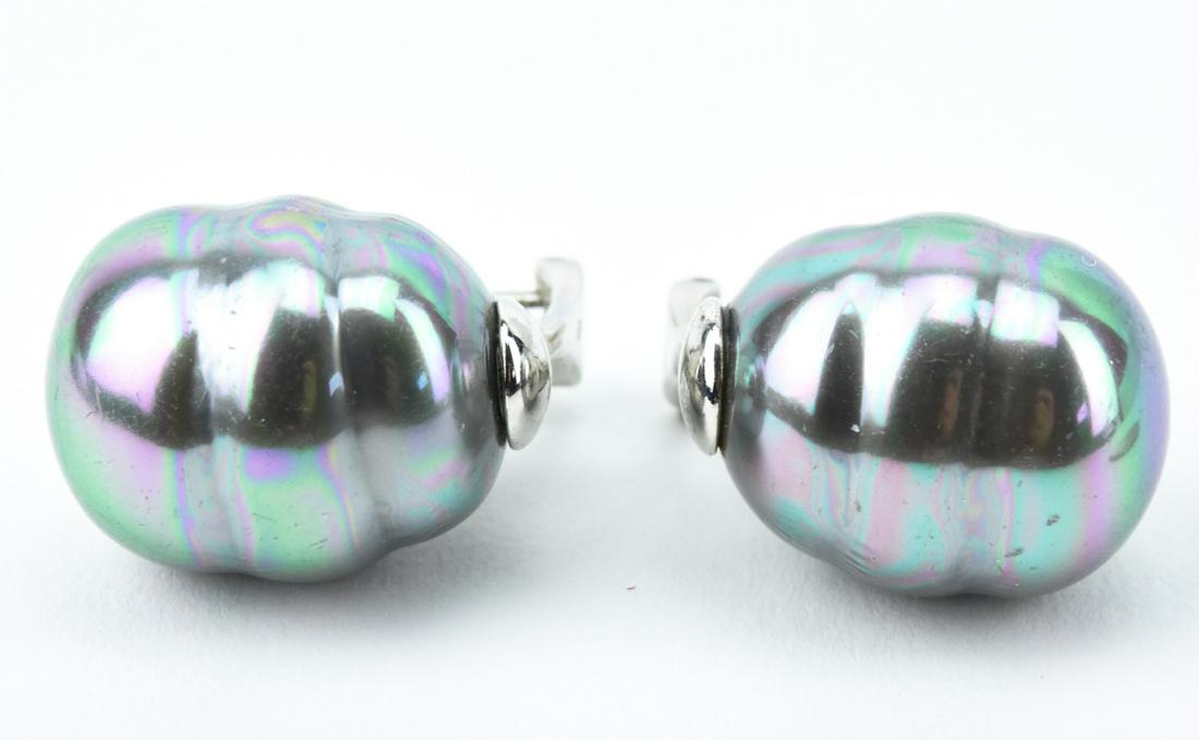 Sterling Silver & Tahitian Baroque Pearl Earrings: Sterling Silver & Tahitian Baroque Pearl Earrings. Each measures 0.75 inches in length.