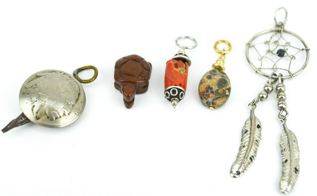 Collection of Native American Necklace Pendants: Collection of Native American Necklace Pendants. Sterling silver dream catcher, buffalo/Indian head nickel, jasper coral and carnelian. Largest measures 2.75 inches in length.