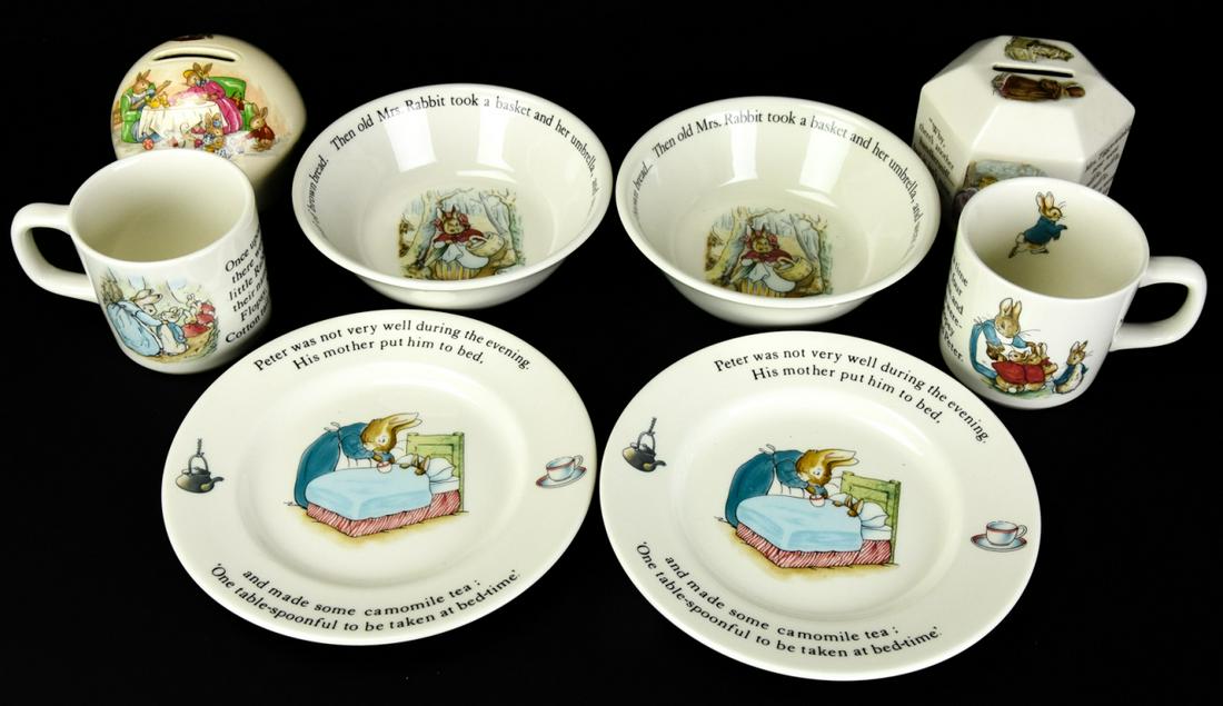 Wedgwood "Peter Rabbit" Juvenile China Set: Wedgwood "Peter Rabbit" Juvenile China Set. Includes two mugs, 2 bowls, 2 saucers and 2 piggy banks. Largest piece measures 6 inches in diameter This sale is online only - no public preview or live in
