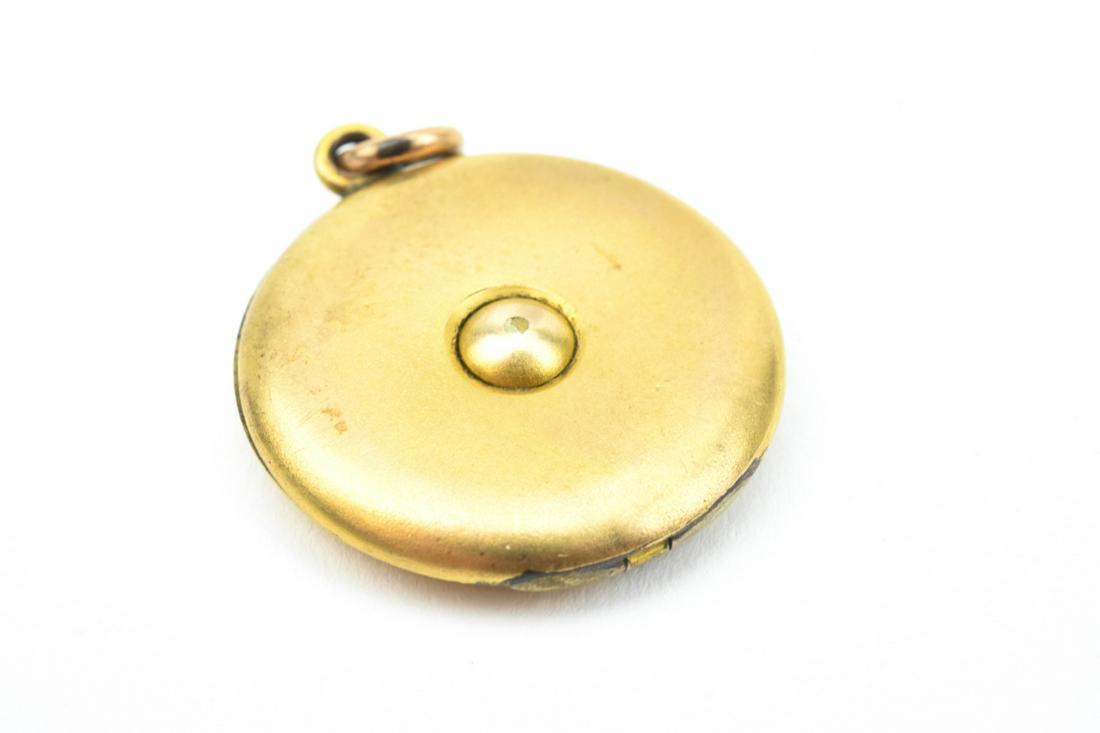Antique 19th C Yellow Gold Locket: Antique 19th C Yellow Gold Locket. Yellow gold-filled locket pendant with cabochon design on front and initials on back. Measures 1.25 inches in length.