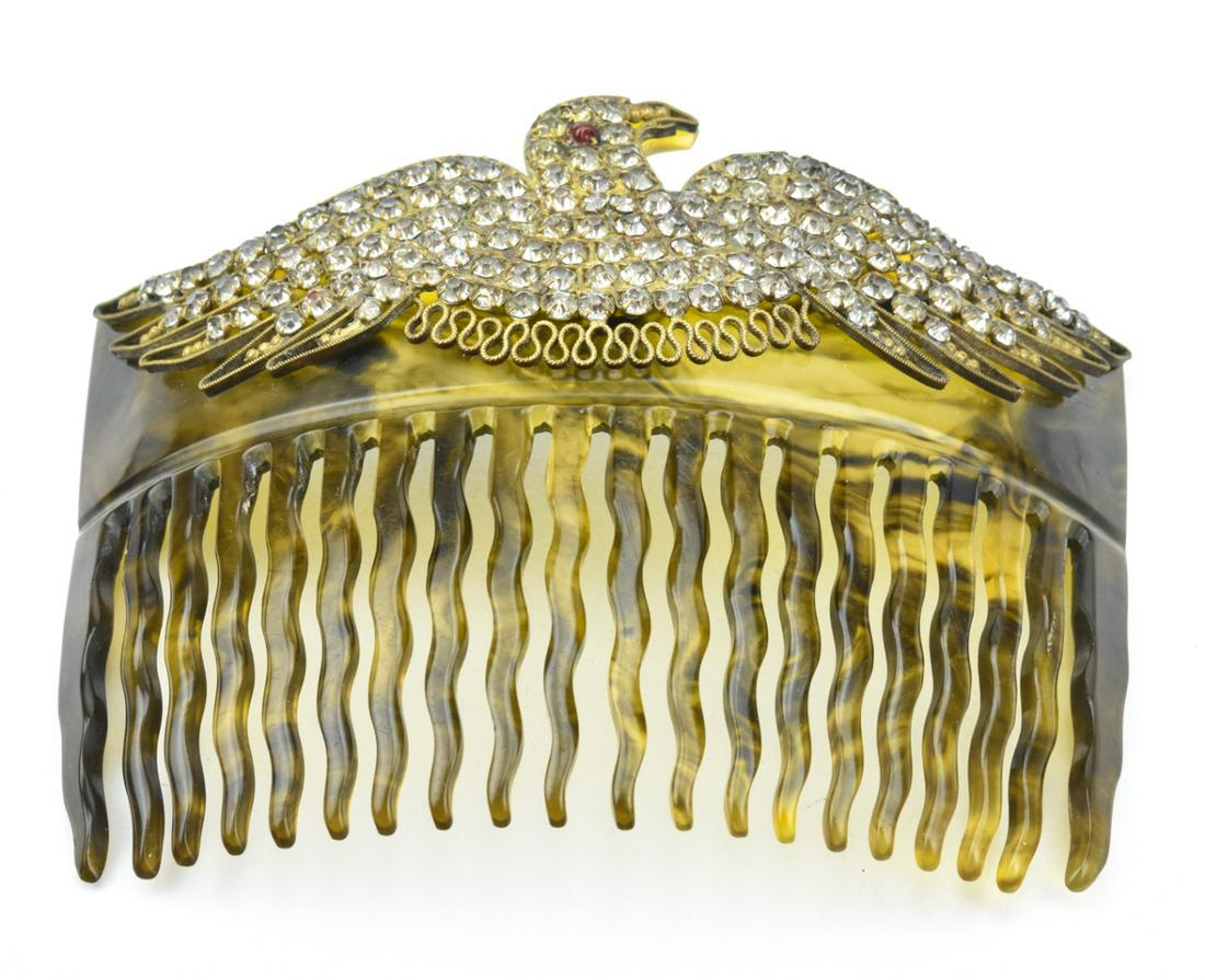 Antique C. 1910 Ornate Paste Set Hair Ornament: Antique C. 1910 Ornate Paste Set Hair Ornament. Early plastic made to resemble tortoise shell, hand carved and mounted with a gilt metal eagle featuring prong set, faux diamonds and faux ruby. Measure