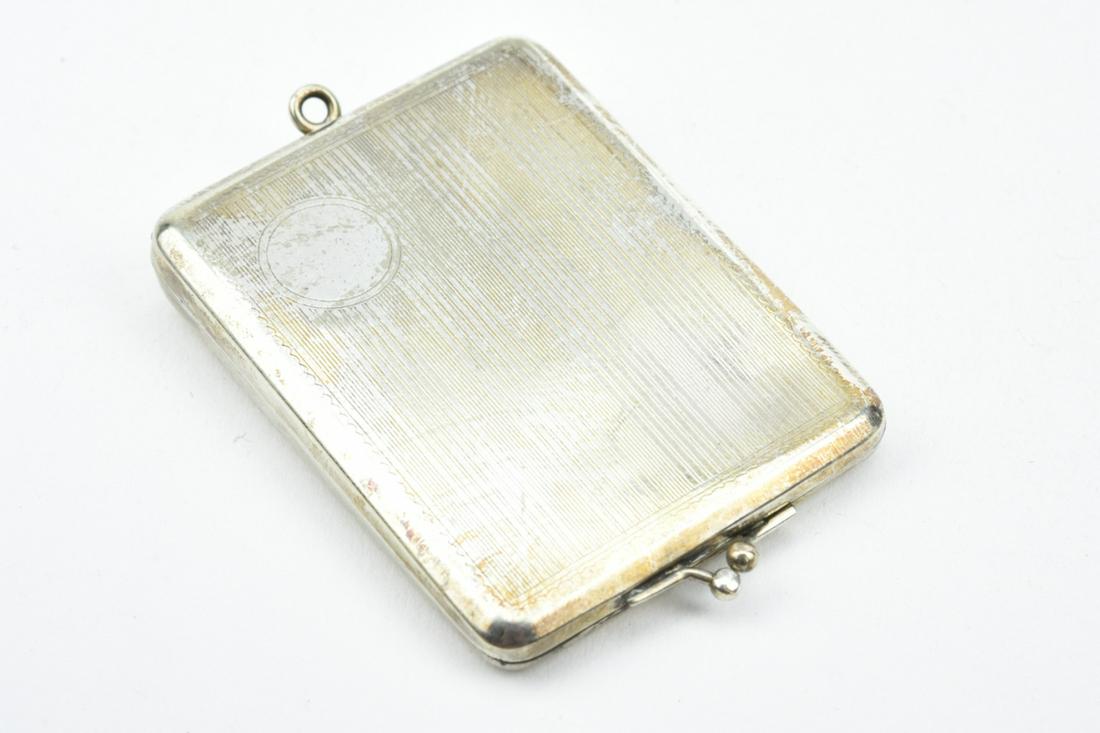 Antique Art Deco Silver Locket Pendant: Antique Art Deco Silver Locket Pendant. Measures 2.75 inches in length.