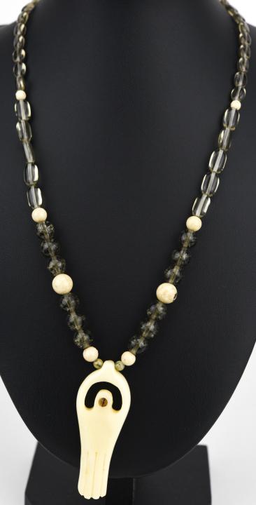 Handmade Smoky Quartz Jasper & Bone Necklace: Handmade Smoky Quartz Jasper & Bone Necklace. Handmade modernist necklace with natural stone beads and carved bone pendant. Measures 18.5 inches in length plus pendant.