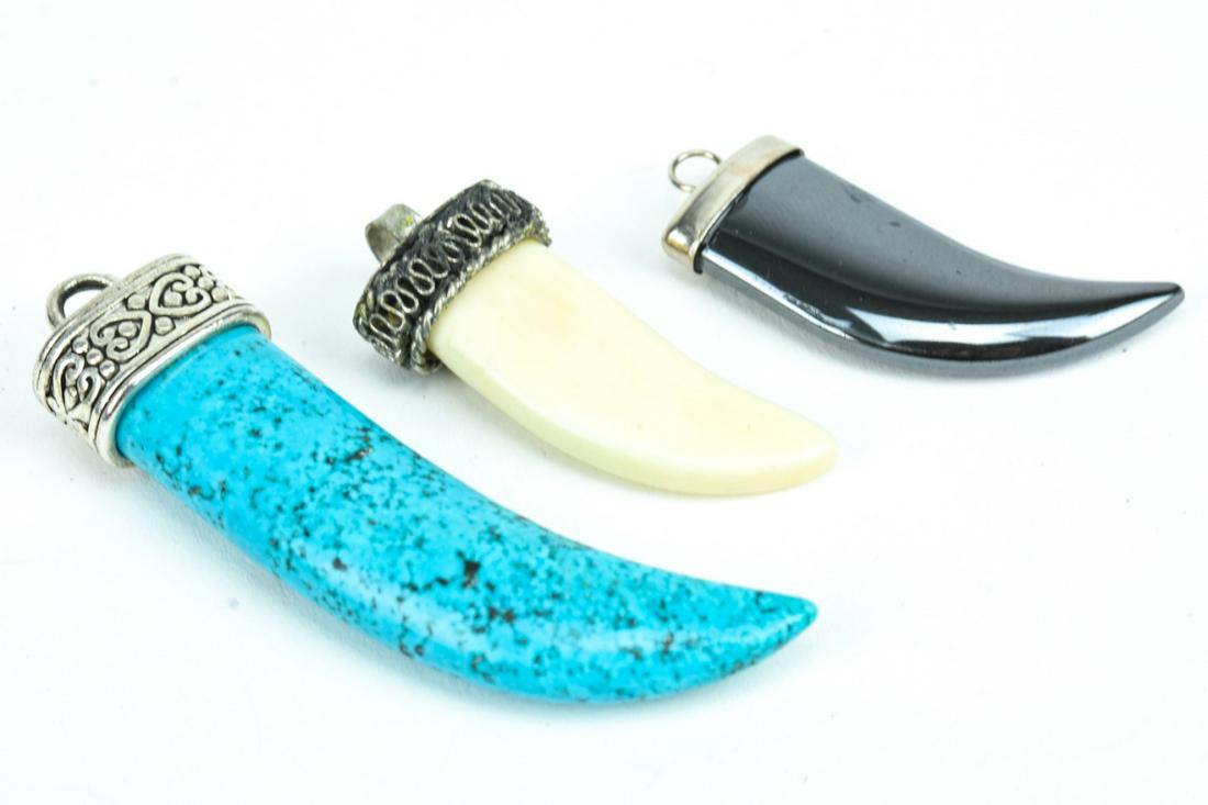 Three Horn Shaped Pendants / Charms w Sterling: Three Horn Shaped Pendants / Charms w Sterling, Hematite, etc. Largest measures 2.25 inches in length.