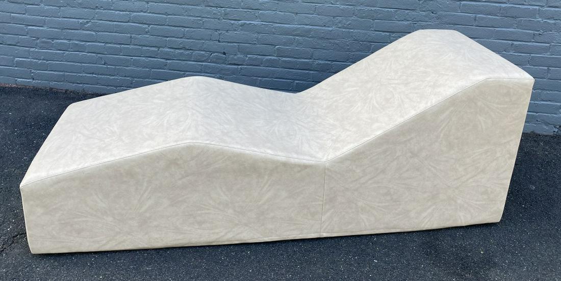 Modern La-Fete Premium Vinyl Wave Chaise Lounge: Modern La-Fete Design Cream All-Weather Premium Yacht Grade Vinyl Wave Chaise Lounge. New in retail sells for approximately 1,000 dollars. Measures 26.5 inches high by 70.5 inches wide by 24 inches de