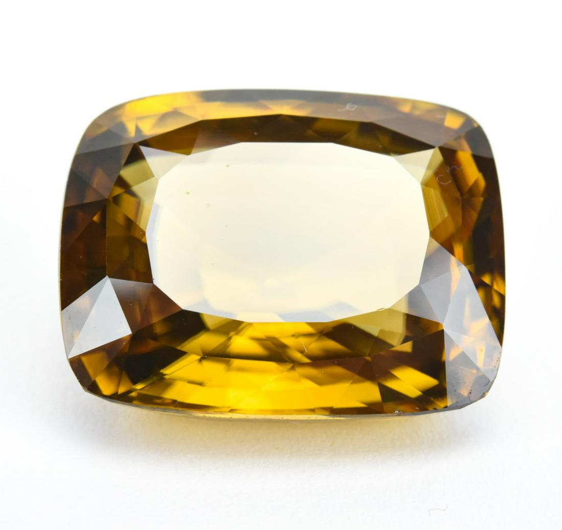 Fancy Cut Approximately 46 Carats Lemon Quartz: Fancy Cut Approximately 46 Carats Lemon Quartz. Tests as quartz on the presidium, may be enhanced.
