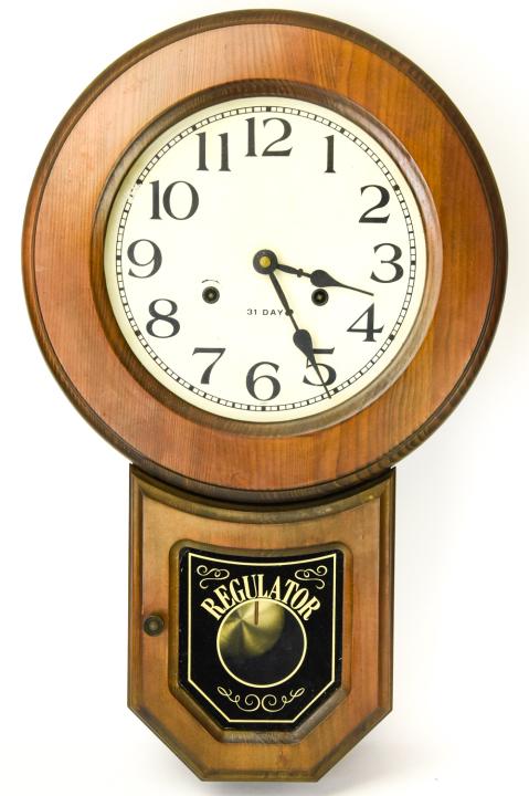 Vintage Regulator 31-Day Case Clock: Vintage Regulator 31-Day Case Clock. 5 inches x 22 inches x 14 inches in diameter.