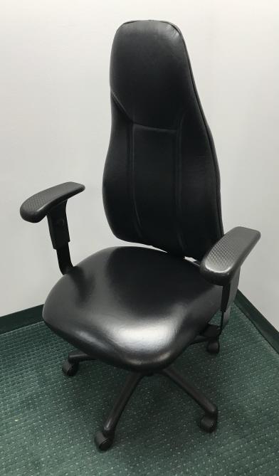 Tall Black Faux Black Leather Executive's Chair: Tall Black Faux Black Leather Executive's Desk Chair. Measures 49 x 29 x 20 inches.