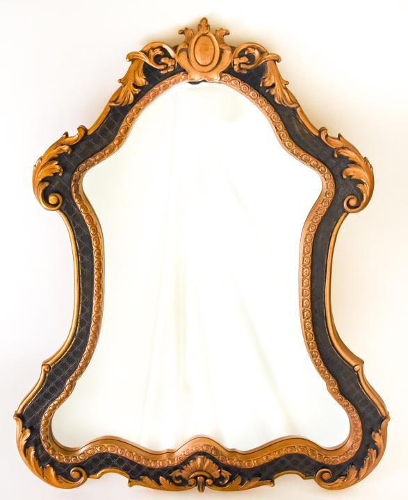 Rococo Style Ebony Toned & Gilt Wall Mirror: Rococo Style Ebony Toned & Gilt Wall Mirror. Measures 42.5 inches high by 34 inches wide.