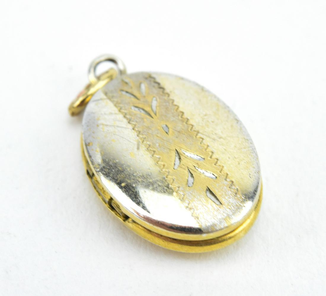 Antique Miniature Gold Filled Locket: Antique Miniature Gold Filled Locket. Necklace pendant or charm. Measures 7/8 of an inch in length.